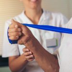 patient practicing physical therapy